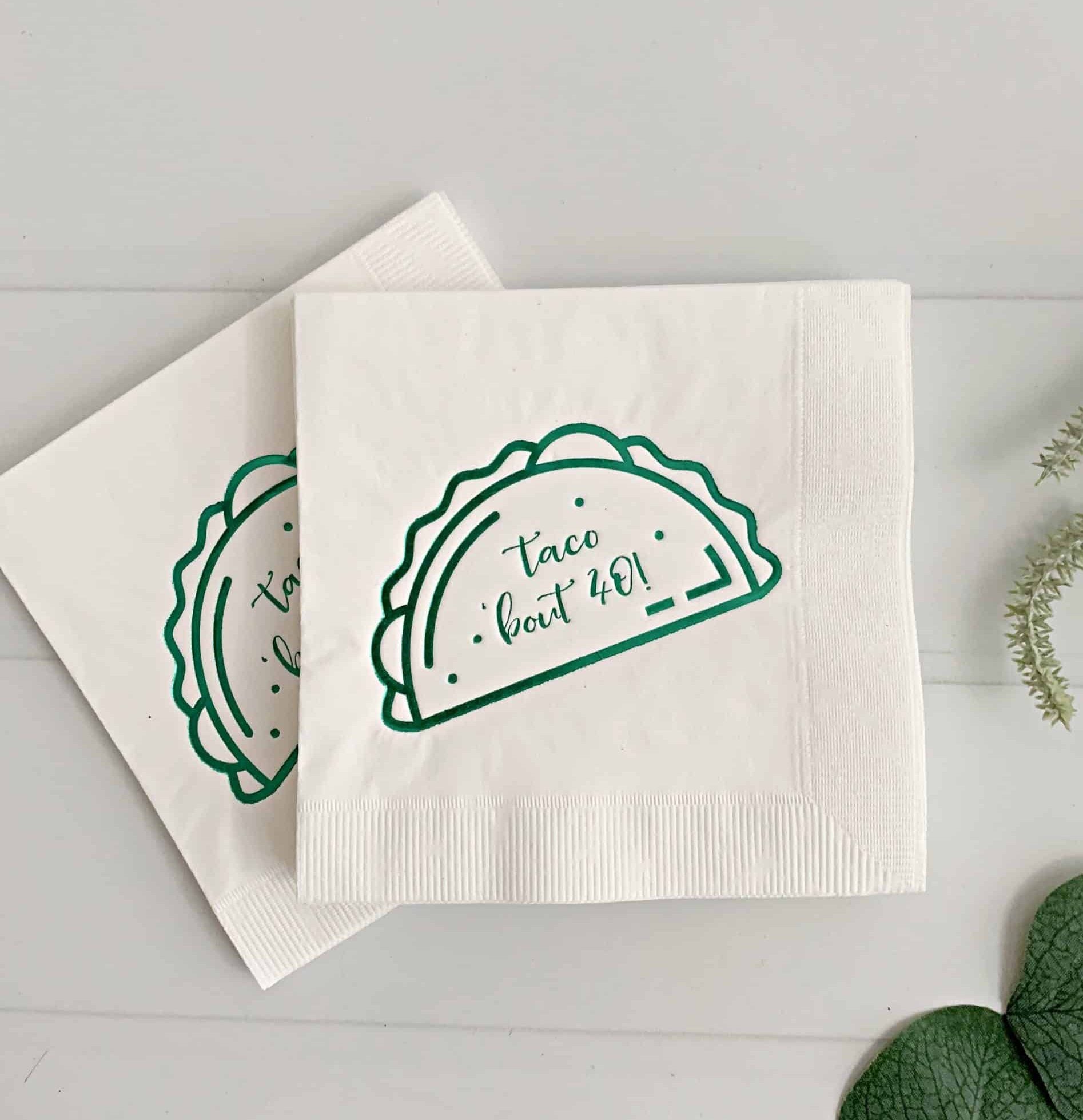 Add a touch of fun to your next fiesta or taco party with our "Taco Bout 40" cocktail napkins in green on white. These playful napkins feature a bright green design and humorous message, making them the perfect choice for a milestone birthday celebration or any fun-filled event. The high-quality material ensures they are both durable and absorbent, making them suitable for both indoor and outdoor events. So, get ready to taco 'bout a good time with our "Taco Bout 40" cocktail napkins.
