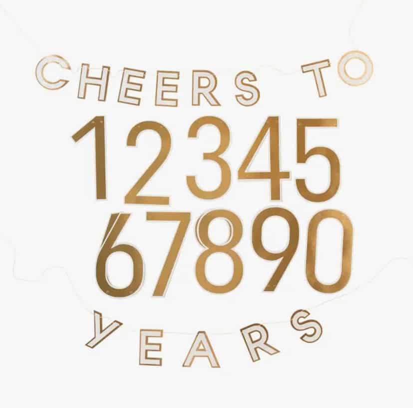 Custom 'Cheers to [Fill in the Blank] Years' birthday or anniversary banner with interchangeable numbers and gold foil letters. Perfect for any celebration. #CheersBanner #GoldFoil #PartyDecorations
