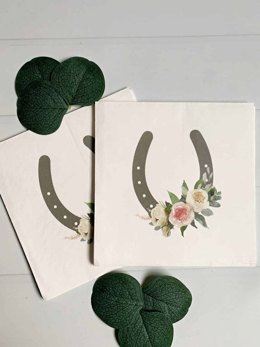 Elevate your Kentucky Derby party with EnFete's original and elegant Kentucky Derby napkins. Add sophistication to your celebration. #KentuckyDerby #ElegantNapkins #EnFete. Get ready for your Kentucky Derby party or other horse-themed event with these beautiful and unique Kentucky Derby Pink Roses Napkins by EnFete. Featuring an exclusive design with ivory and blush roses and horseshoes, these three-ply tissue napkins come in a set of 16 and are perfect for adding a touch of elegance to your party decor.