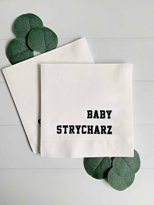 Personalize your baby celebration with varsity lettered napkins. Choose baby's name. 50 min. 6.5 sq. black foil imprint.