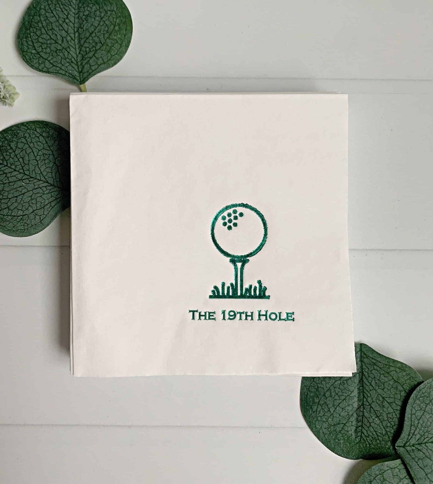 19th hole golf napkins for your masters golf party, birthday or after tournament party. White cocktail napkins with forest green foil.
