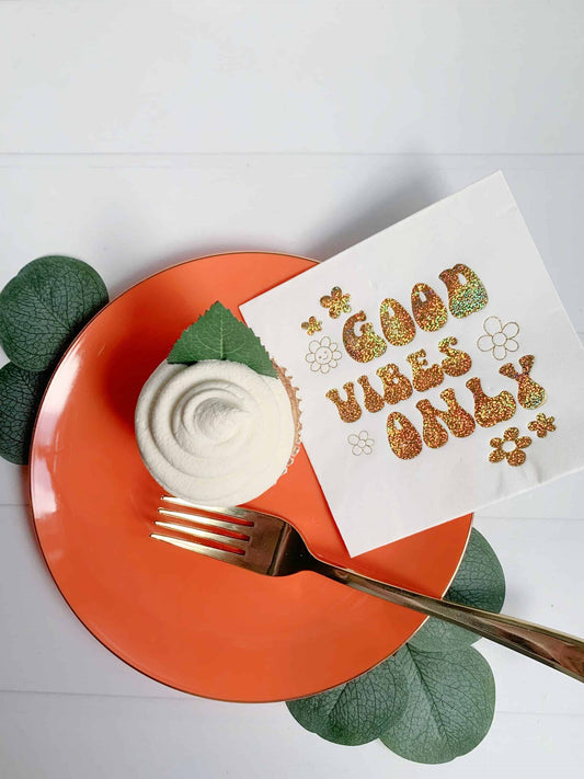 Spread good vibes at your celebration with our exclusive Good Vibes Only cocktail napkins on an eye-catching orange plate. #GoodVibesOnly #TwoGroovy #PartySupplies.