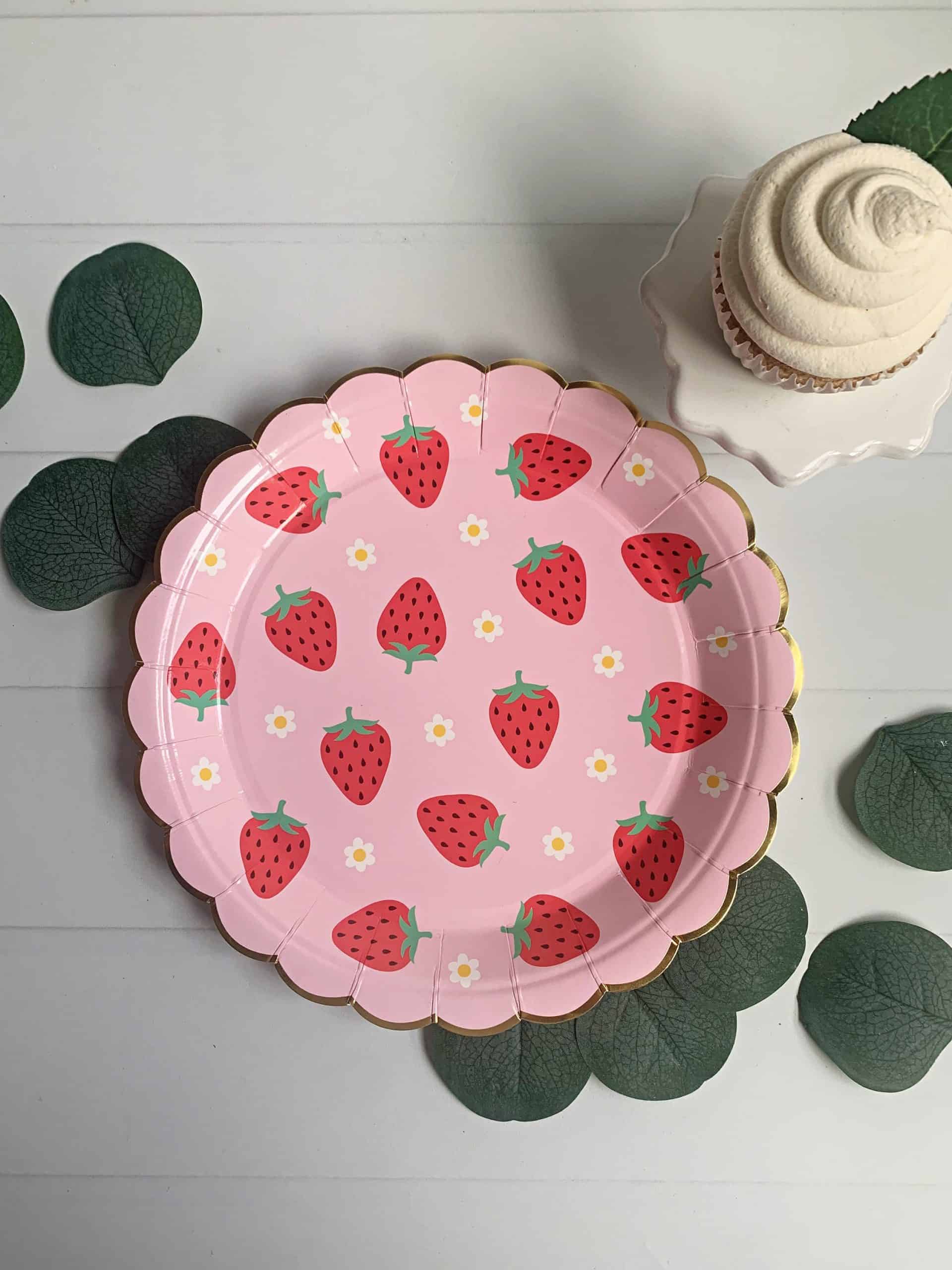 Add a touch of summer to your table with our strawberry dinner plates in pink with strawberries. These charming plates feature a delicate illustration of ripe strawberries, making them the perfect choice for a summer garden party, outdoor barbecue, or any other celebration. The vibrant pink color and playful design make them suitable for a variety of themes and color schemes. Whether you're serving a main course or simply adding a touch of charm to your table setting, these plates are sure to bring a smile 