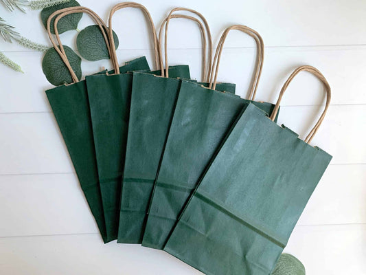 Hunter green gift and favor bags. Perfect for a Hole in One party or wedding welcome bag.