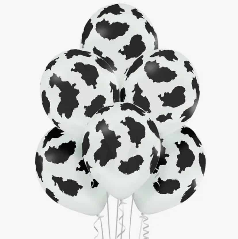 Space Cowgirls" Bachelorette party with cowprint balloons and cupcake wrappers, disco ball napkins, and shiny silver accents