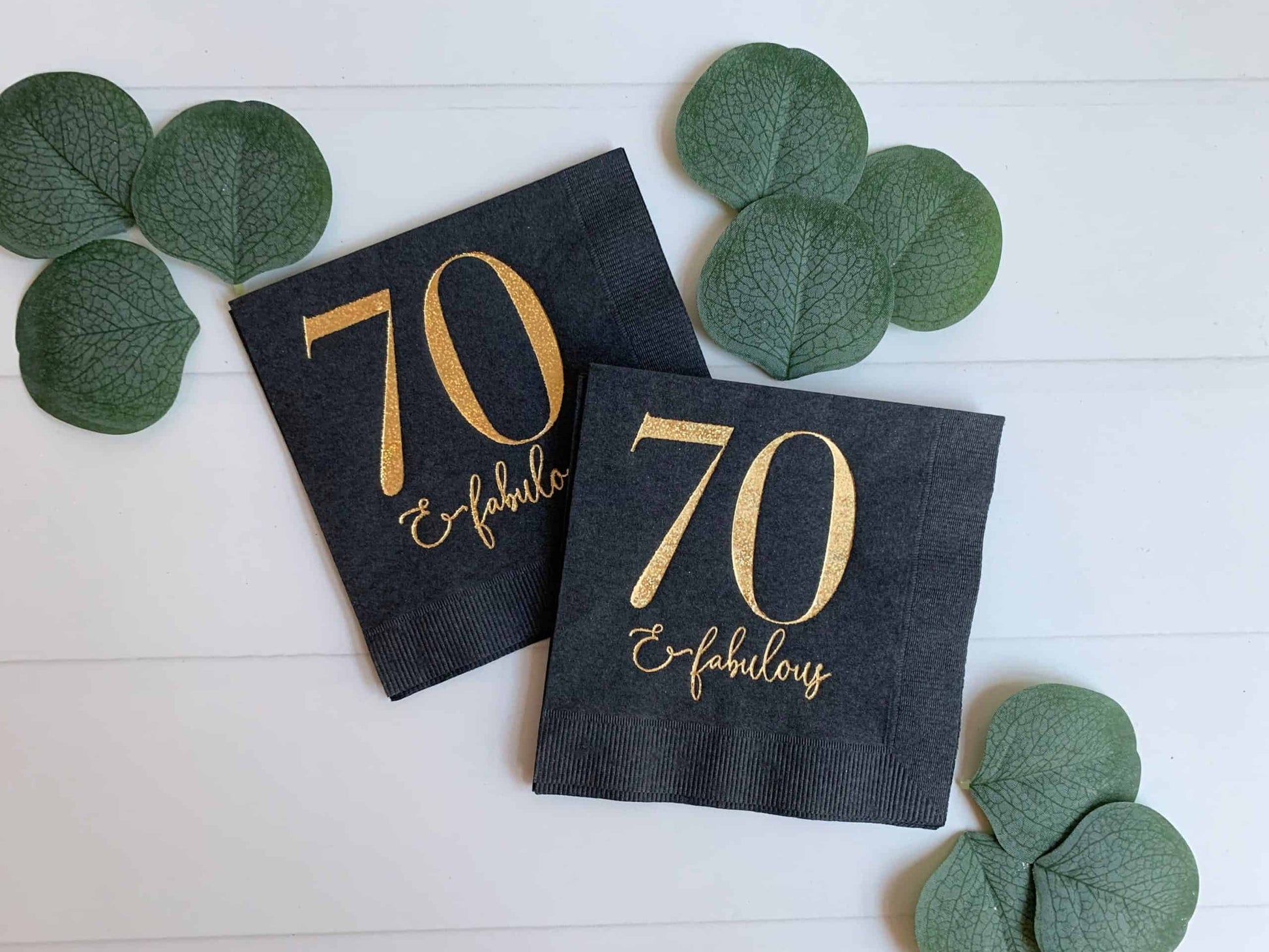 Use these stunning gold glitter foiled 70 and fabulous black cocktail napkins at your 70th birthday party. Perfect to celebrate a milestone! Gold glitter foil imprint - gorgeous details on the EnFete original napkins.