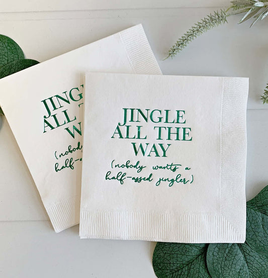 Funny holiday napkins for your Christmas and New Year's cocktails. Each napkin is printed with "JINGLE ALL THE WAY" in green file on white cocktail napkins (because nobody wants a half-assed jingler).