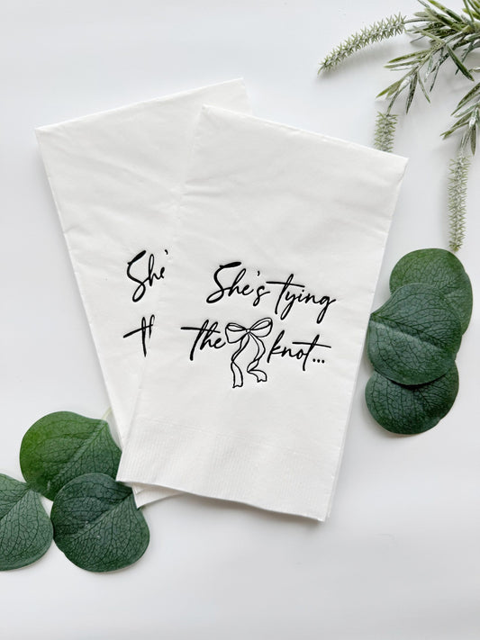Introducing our "She's Tying The Knot"  black and white Dinner Napkins, featuring a chic preppy bow design that adds a touch of elegance to your bridal shower or bachelorette party