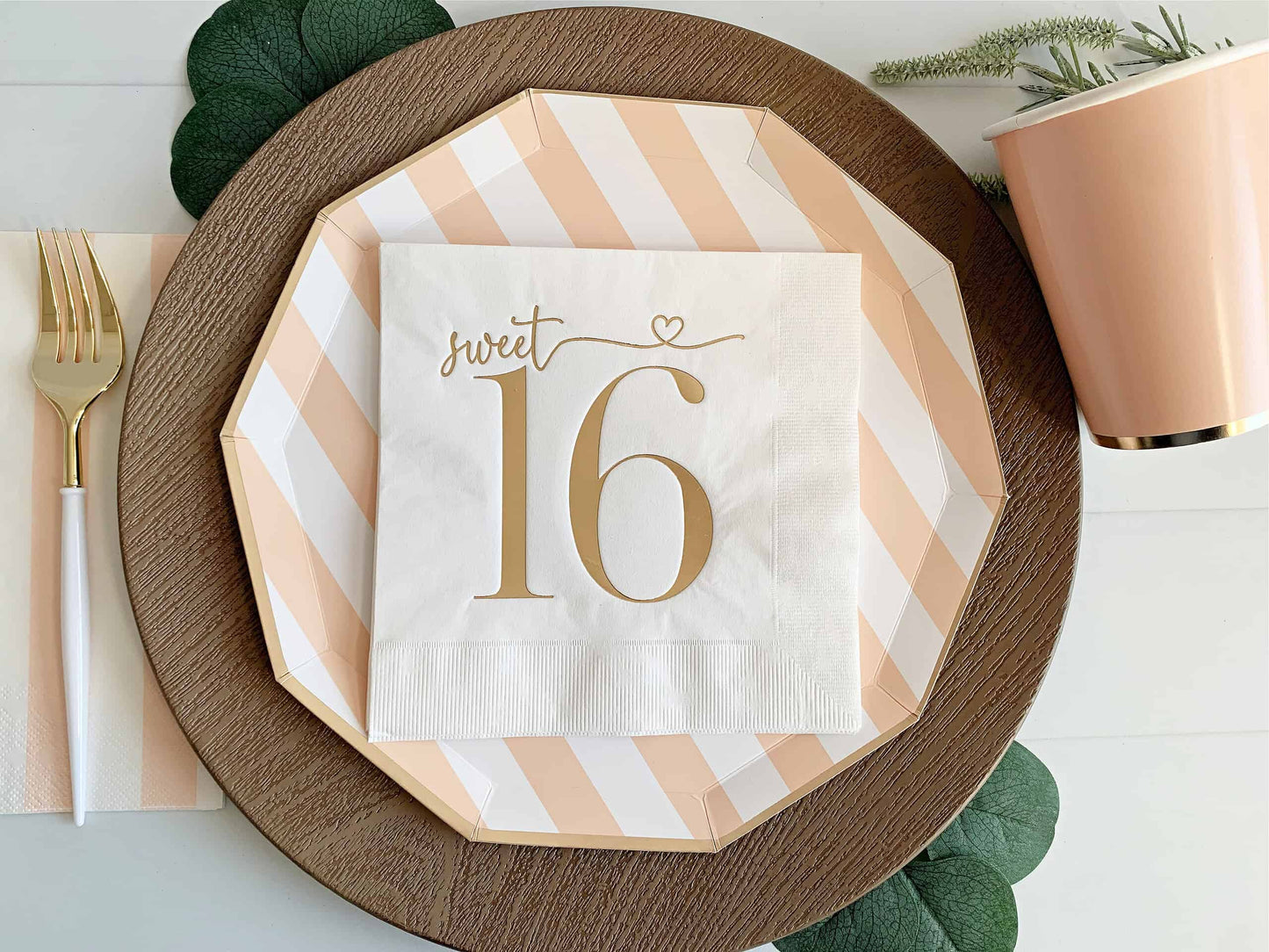 Add a touch of elegance to your Sweet 16 celebration with our "Sweet 16 Luncheon Napkins - Gold on White" by EnFete. These high-quality, disposable napkins feature a stunning gold pattern