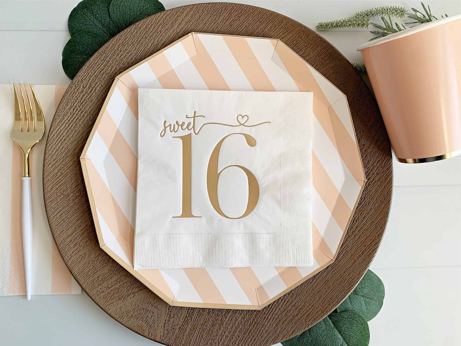 Add a touch of elegance to your Sweet 16 celebration with our "Sweet 16 Luncheon Napkins - Gold on White" by EnFete. These high-quality, disposable napkins feature a stunning gold pattern