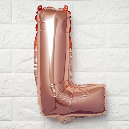 Rose gold letter 'L' balloon on a white textured background