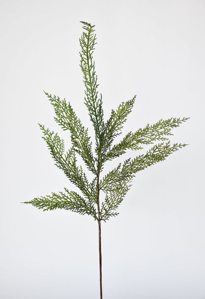 Artificial plant branch on a white background