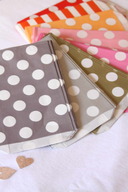 grey and silver polka dotted treat bags for a winter baby shower