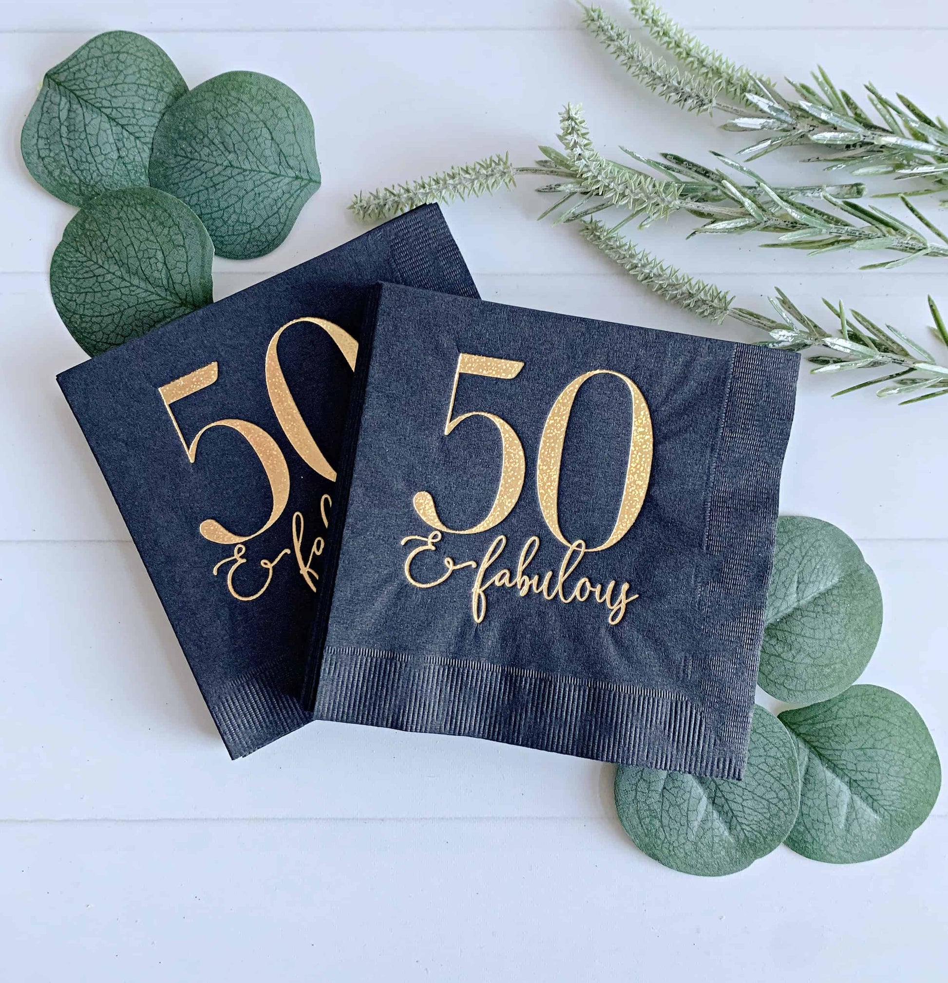 Use these stunning gold glitter foiled 50 and fabulous cocktail napkins at your 50th birthday party. Perfect to celebrate a milestone! Stunning black cocktail napkins with gold glitter font - elegant napkins for a birthday party or cocktails.