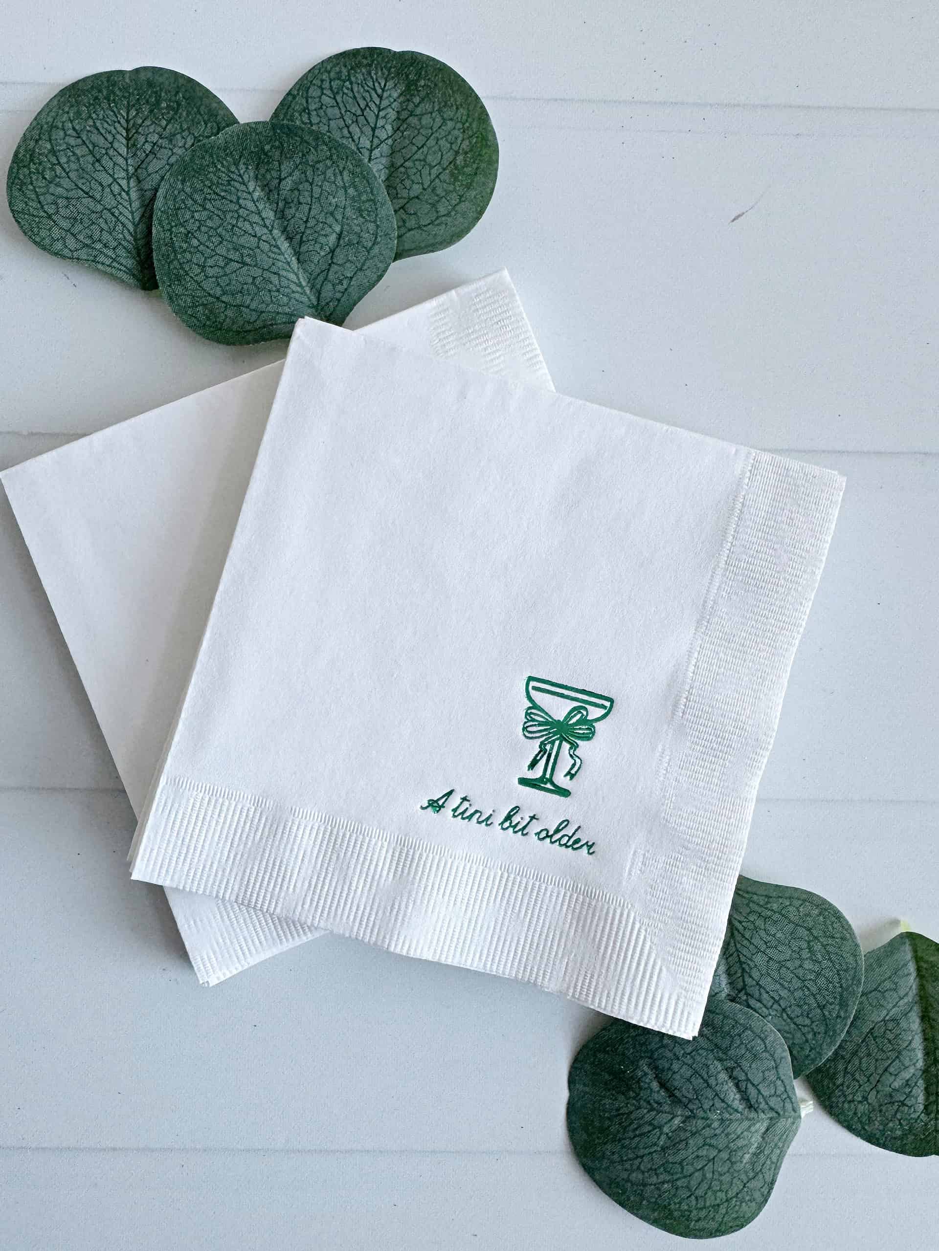 Introducing the sensational "A Tini Bit Older" birthday cocktail napkins, consisting of sixteen beautifully designed cocktail-sized napkins. Elevate your next birthday soirée or gathering with these sophisticated white napkins