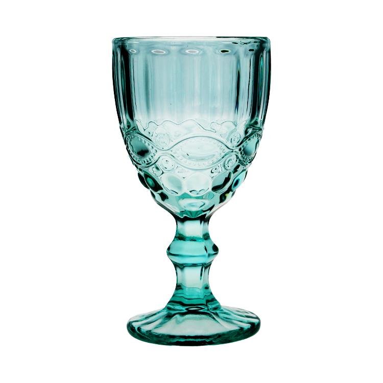 Turquoise glass with decorative pattern on a white background
