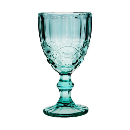 Turquoise glass with decorative pattern on a white background