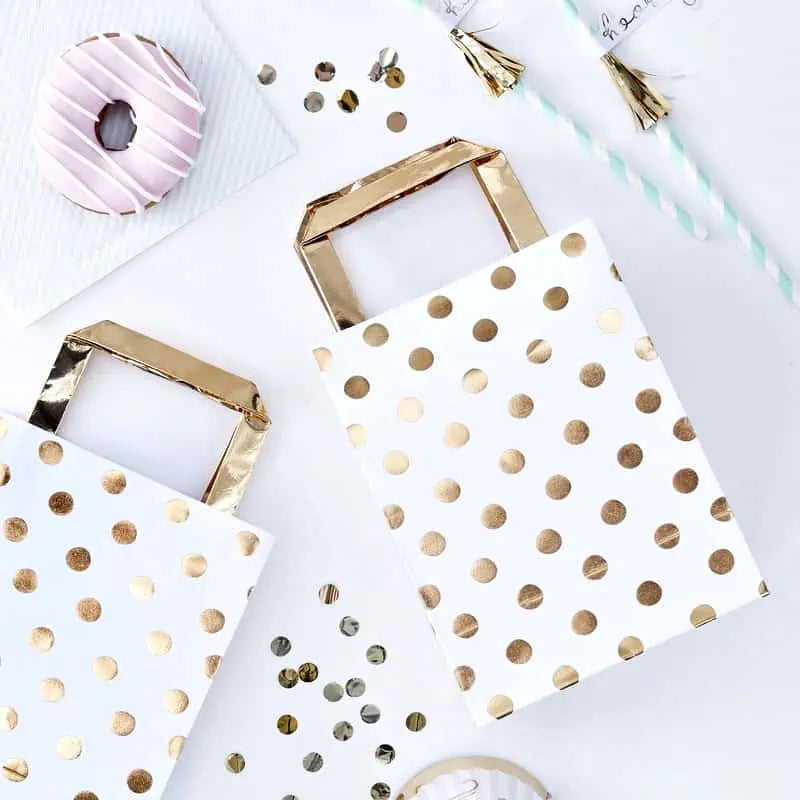 gold handled bag favors