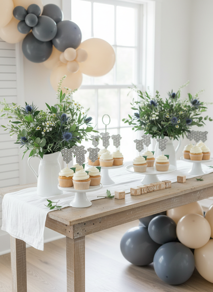 Baby shower tablescape with onesie toppers