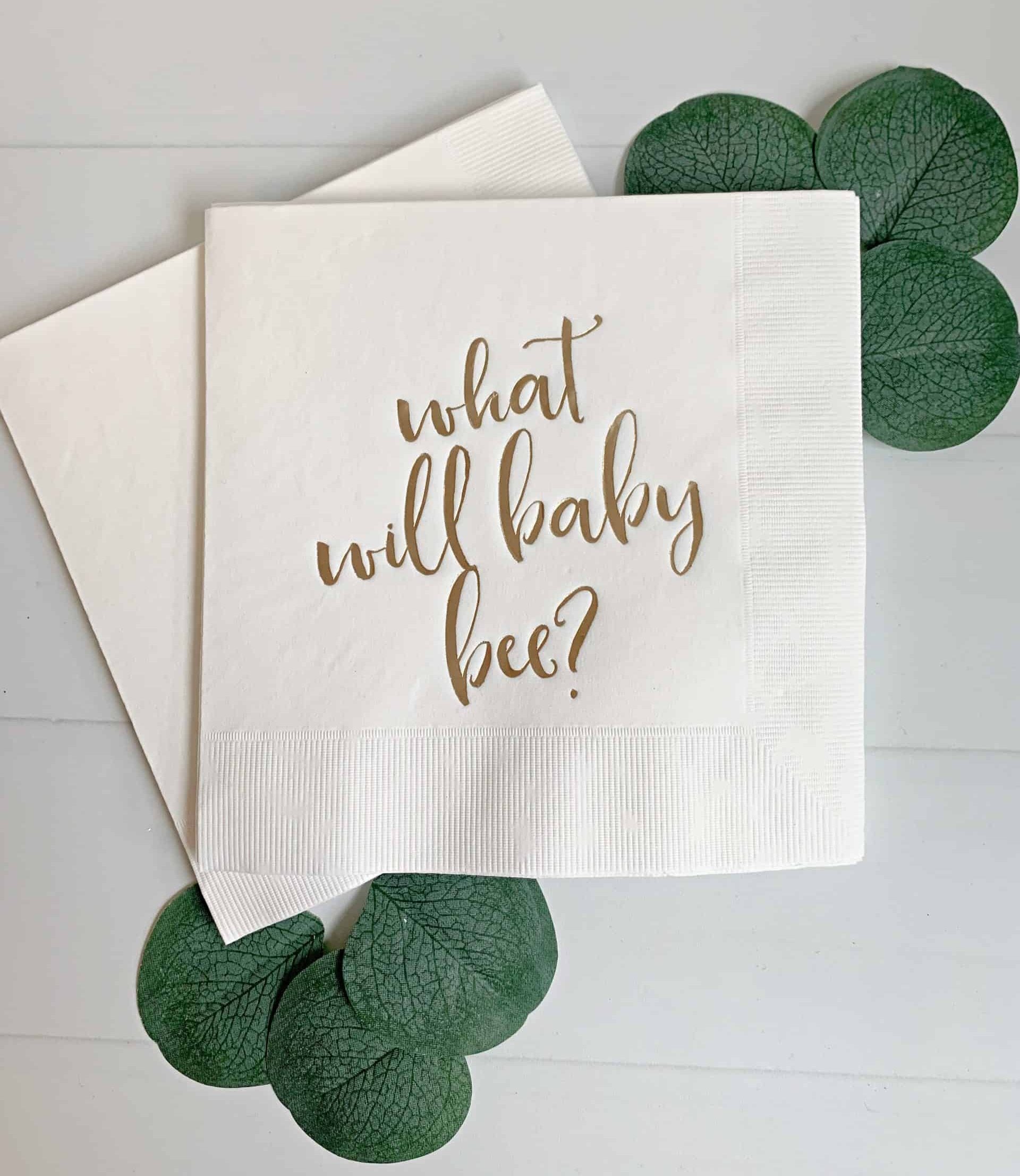 These fab white gender-reveal paper napkins are the finishing touch for your Baby Bee themed gender-reveal party! Each napkin has a beautiful script "What will baby bee?" in gold foil. Perfect for honeybee-themed gender reveals.