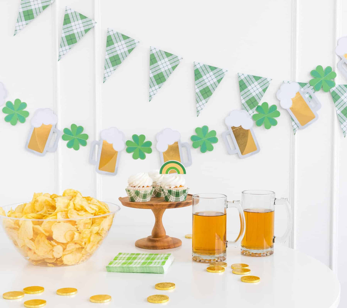 Alternating shamrocks and beer mugs with gold foil on a banner for St. Patrick's Day Decorations.