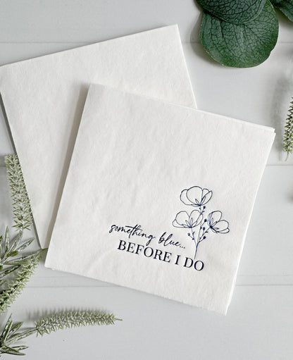 These blue and white bridal shower decorations bring a refined twist to the traditional “something blue” theme. Featuring our exclusive Something Blue Before I Do cocktail napkins—designed with graceful script and classic motifs—your drink stations and dessert tables will have a polished, cohesive look.