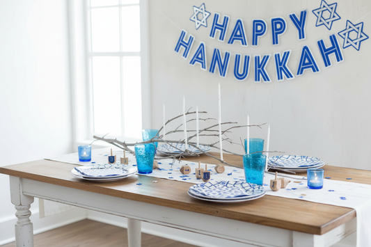 Bright airy Hanukkah table setup for collection photo