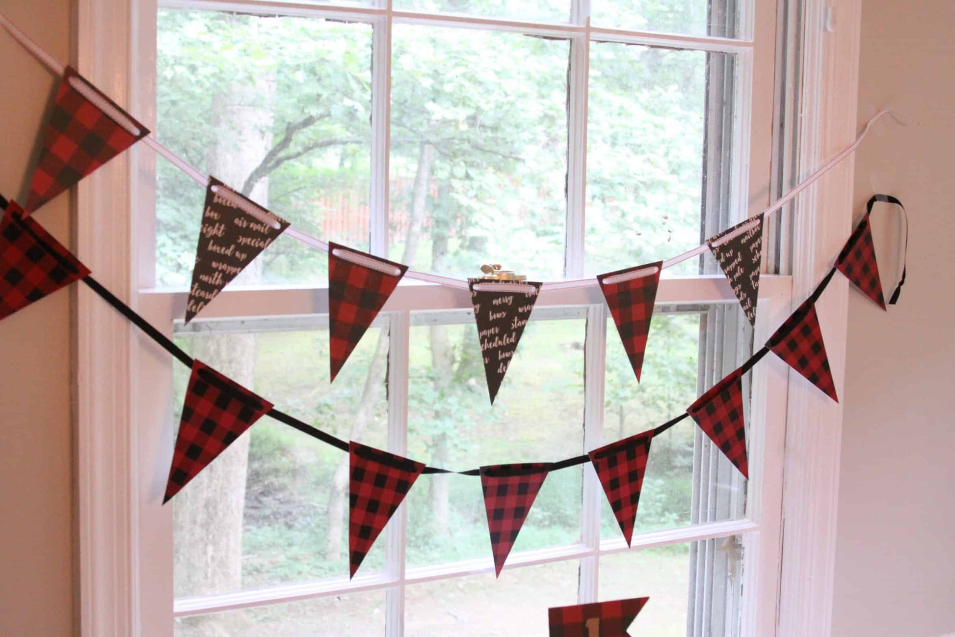 buffalo plaid buntings for a lumberjack christmas birthday party