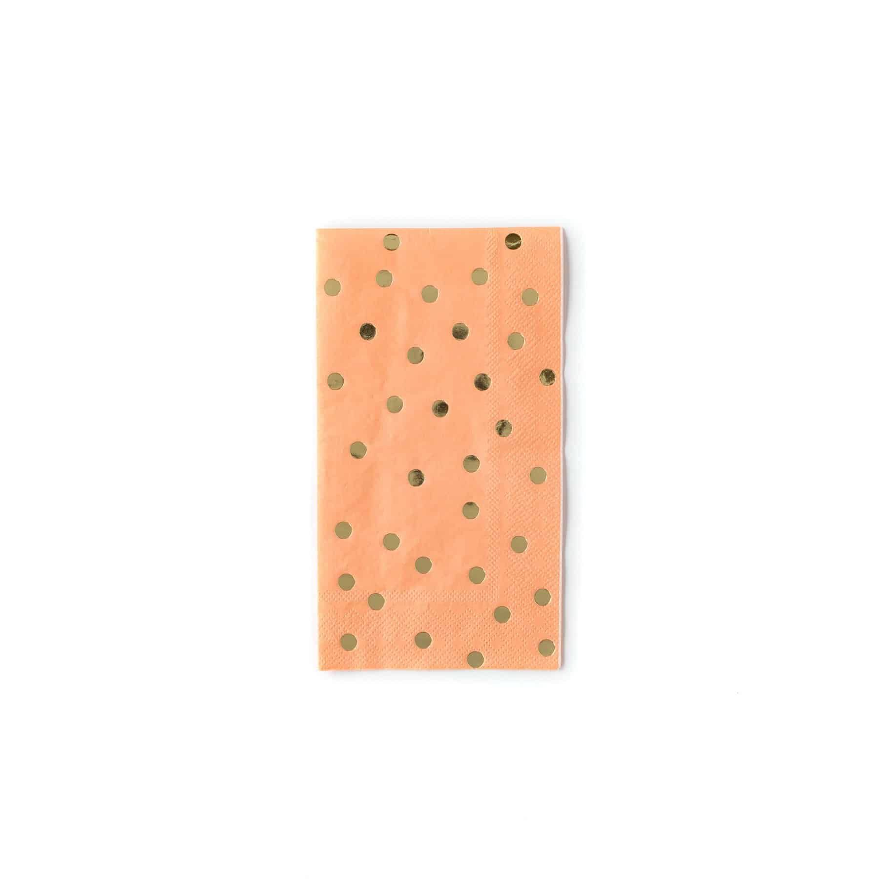 Coral dinner napkins with gold polka dots