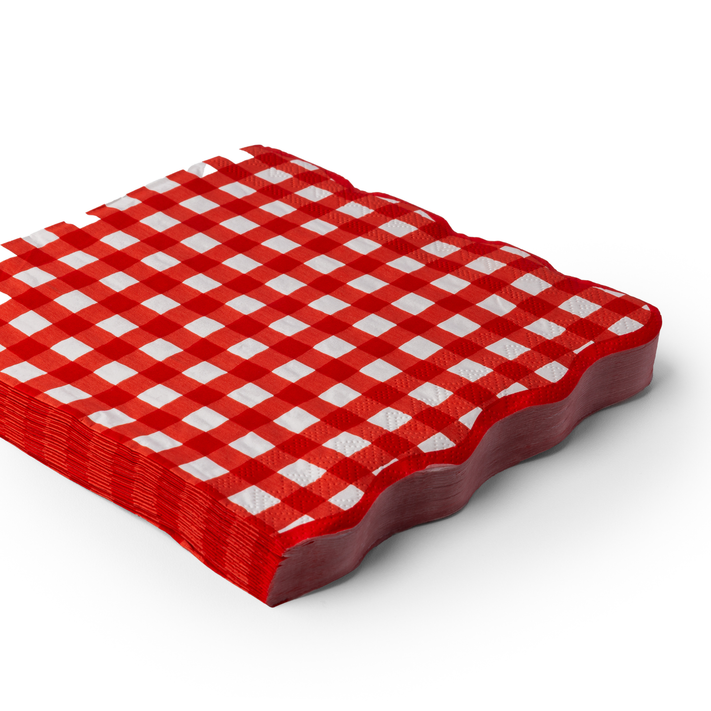 Stack of red and white checkered paper luncheon on a white background