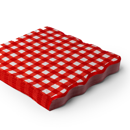 Stack of red and white checkered paper luncheon on a white background