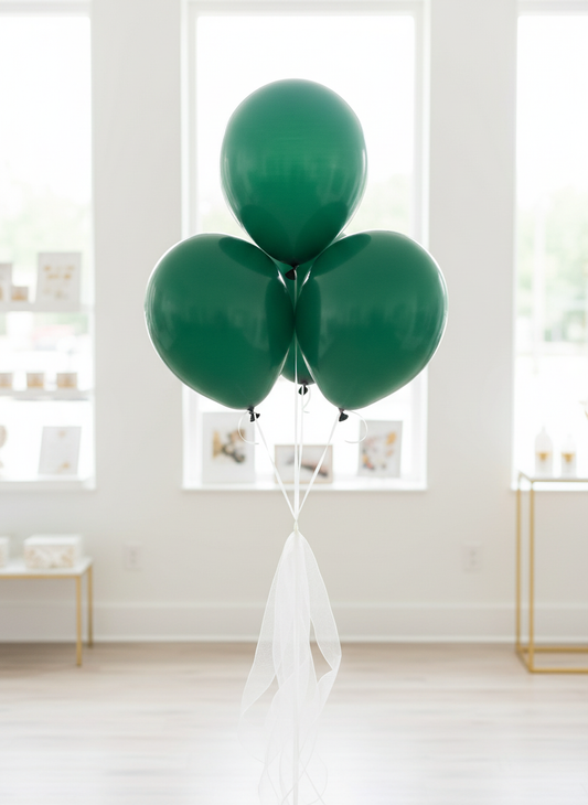 Emerald green balloon bouquet with white organza ribbons
