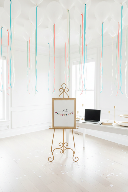 EnFete Bright White Display with Gold Accents