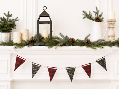 A festive Christmas mantel display featuring a red and black buffalo plaid bunting banner hanging across a white fireplace mantel, decorated with pine garlands, a black lantern, candles, and a white pitcher.