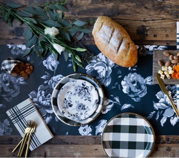 Farmhouse Table Runner made from paper printed with bold cabbages roses - black background with cream colored floral design