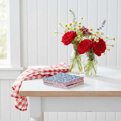 French country kitchen table with blue floral napkins