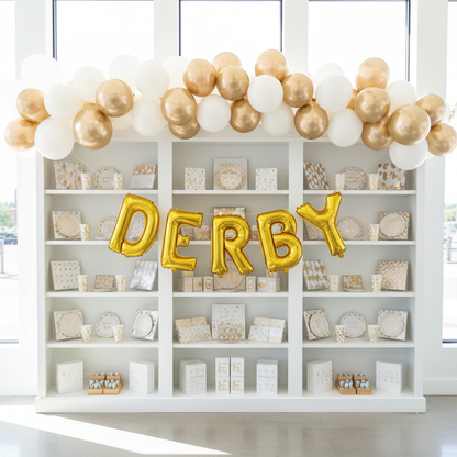 Gold Derby Balloons with Cream and Gold Arch in Bright Shop