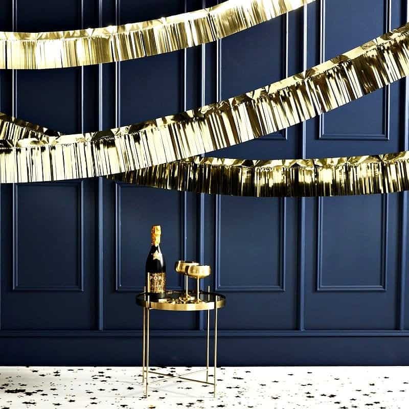 Gold fringe garland for a baby shower, New Year's Eve wedding or bridal shower