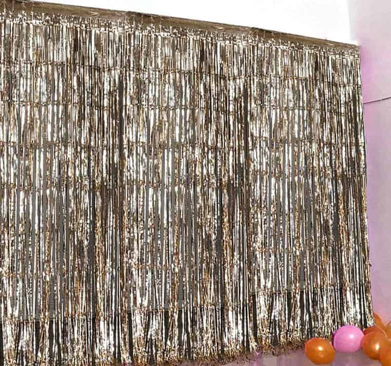 Gold fringe photo booth backdrop of virtual party backdrop