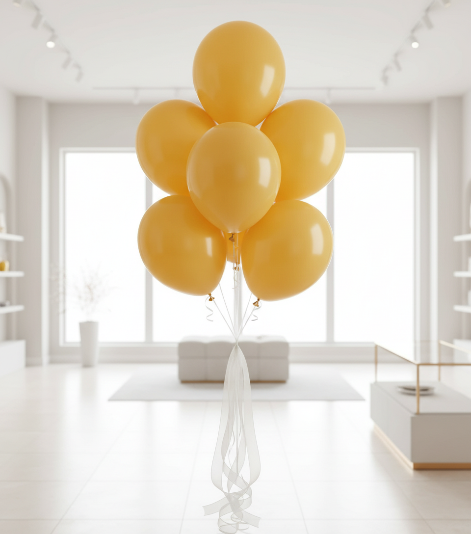 Goldenrod yellow balloon bouquet with white organza ribbons