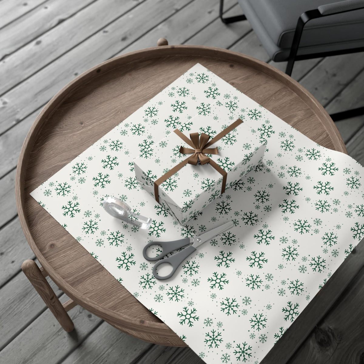 Elegant luxury Christmas gift wrap in sage and emerald shades with snowflakes for a winter theme. Perfect for a Baby It's Cold outside baby shower or birthday party..