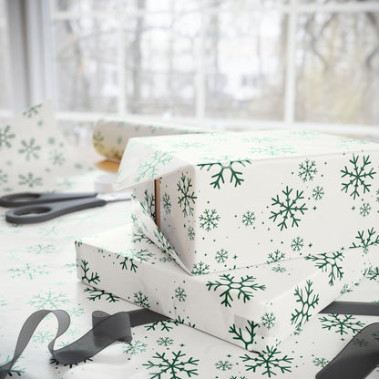 Elegant luxury Christmas gift wrap in sage and emerald shades with snowflakes for a winter theme. Perfect for a Baby It's Cold outside baby shower or birthday party..