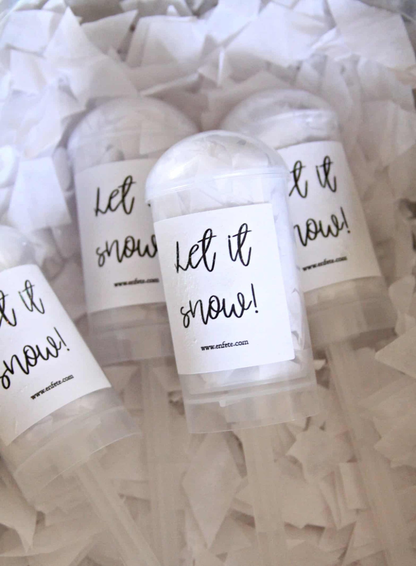 Snow Confetti Poppers for the perfect winter wedding send off. They have a sparkly Let it Snow label and filled with fake snow confetti.