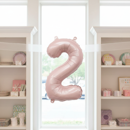Matte Blush Number 2 Balloon Between Bookcases
