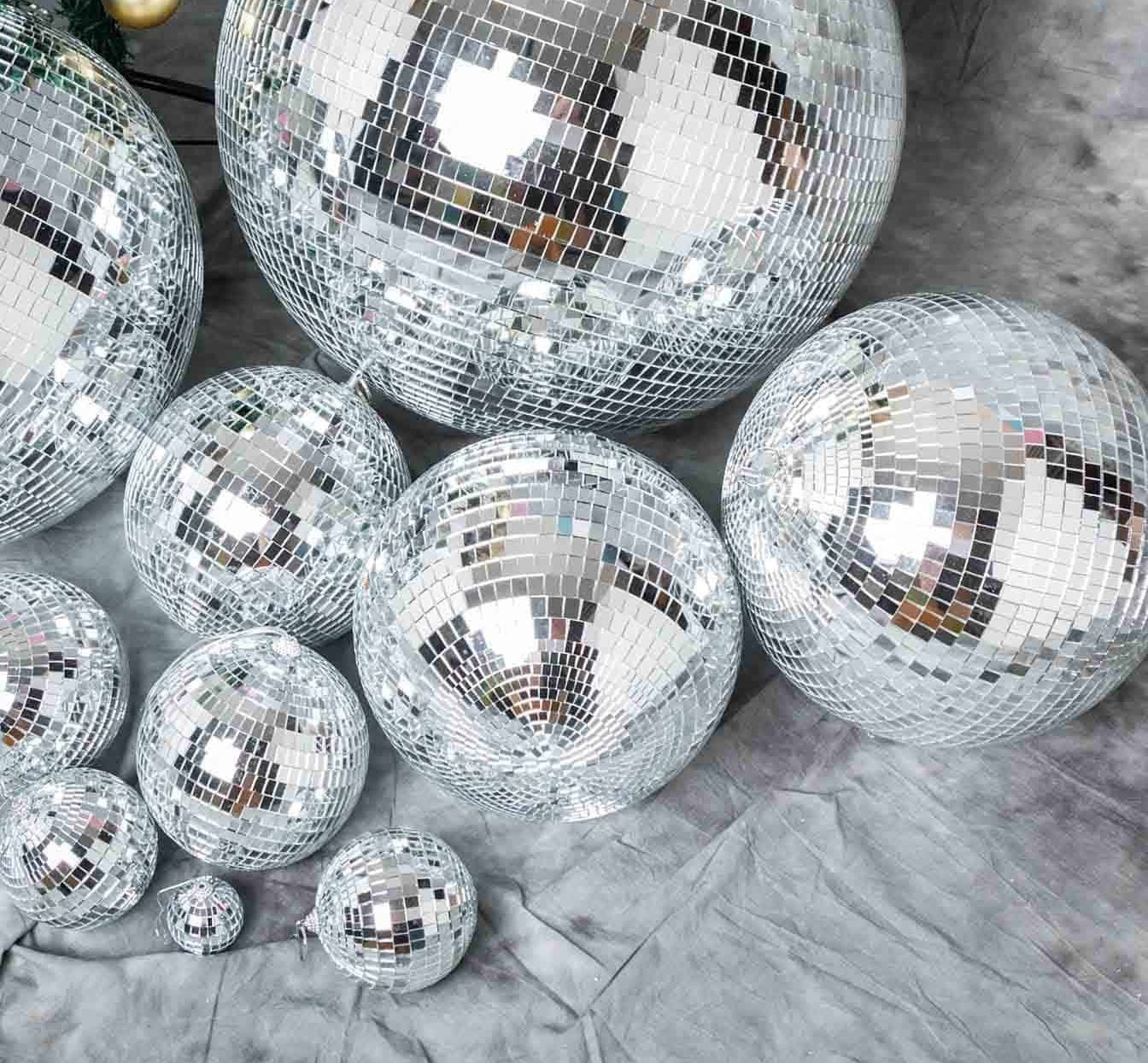 Mirrored Disco Balls - Light up Your Dance Party with Our Mirrored Foam Core Disco Balls! Get groovy with our range of sizes from 2 inches to 12 inches, perfect for hanging at your disco, birthday, or New Year's Eve bash!