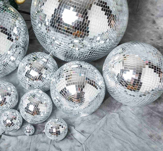 Mirrored Disco Balls - Light up Your Dance Party with Our Mirrored Foam Core Disco Balls! Get groovy with our range of sizes from 2 inches to 12 inches, perfect for hanging at your disco, birthday, or New Year's Eve bash!