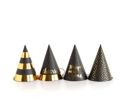 Four assorted patterns for gold and black New Year's Eve party hats.