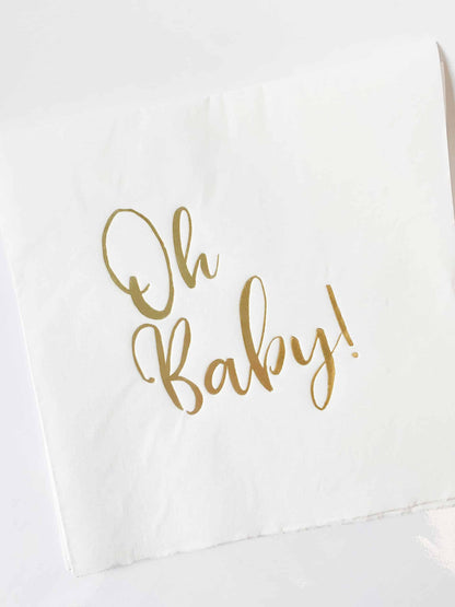 Welcome your new little one in style with our beautiful "Oh Baby" luncheon napkins. Featuring gold foil script on white napkins, these napkins are the perfect accent to your baby shower and will add a touch of boho-chic with classic elegance to your celebration. The neutral palette makes these napkins perfect for baby girls or baby boys, and they're a great choice for a Safari baby shower, Oh Baby shower, or any other theme. Product Details: 16 "Oh Baby" luncheon napkins per pack Gold foil script on white n