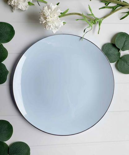 Overhead flat lay of ice blue plates