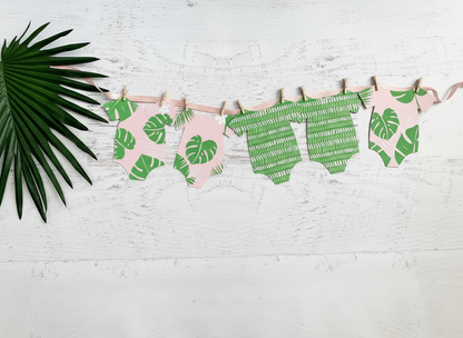 Overhead flat lay of onesie banner